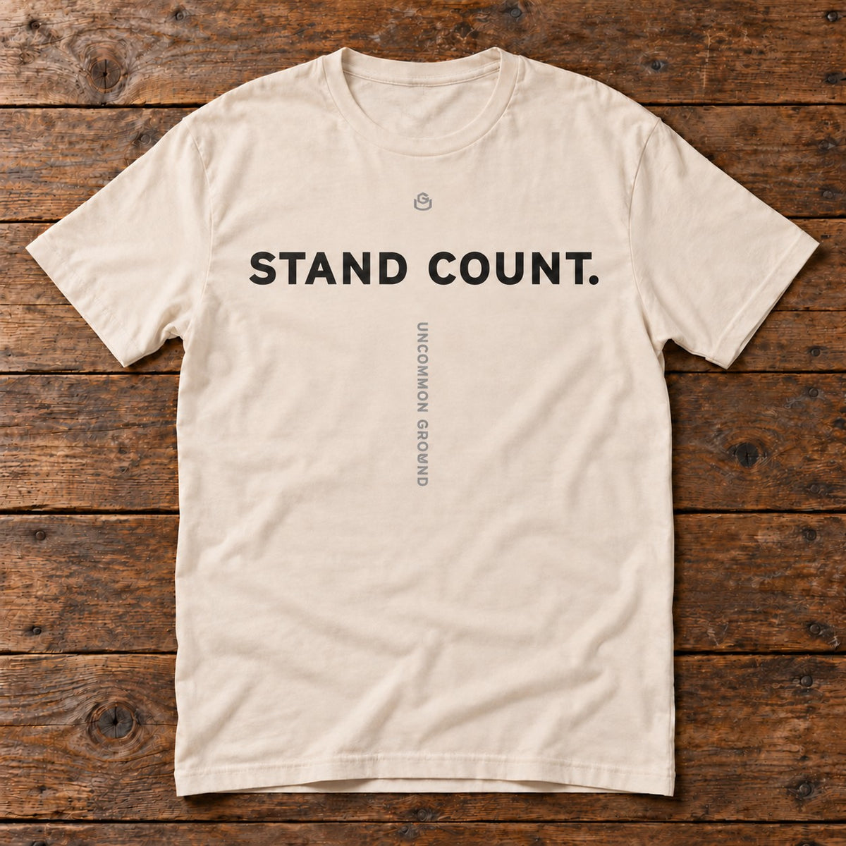 Front of the Stand Count Tee reading STAND COUNT.