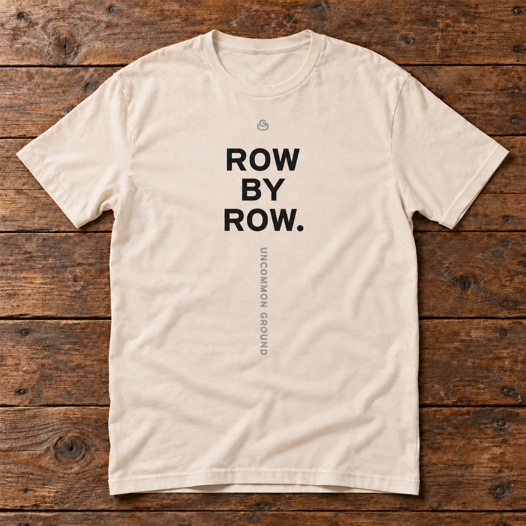 Front of the Row by Row Tee reading ROW BY ROW.