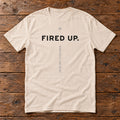 Front of the Fired Up Tee reading FIRED UP.