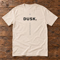 Front of the Dusk Tee reading DUSK.