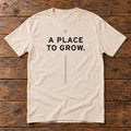 Front of the A Place to Grow Tee reading A PLACE TO GROW.