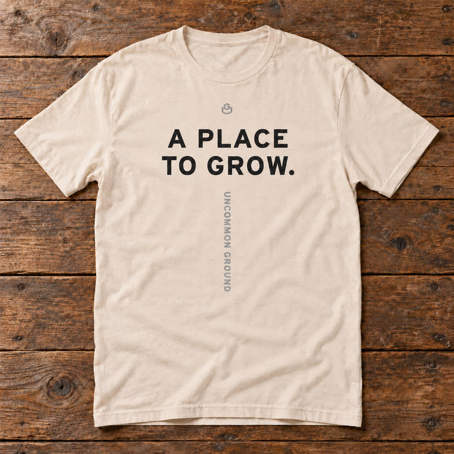 Front of the A Place to Grow Tee reading A PLACE TO GROW.
