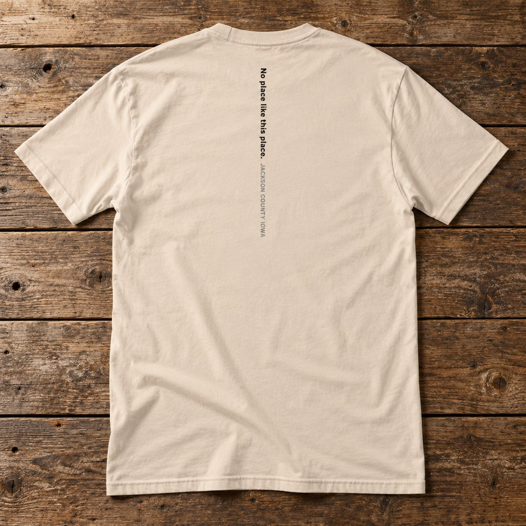 Back of the Uncommon Ground Tee reading No place like this place. Jackson County Iowa
