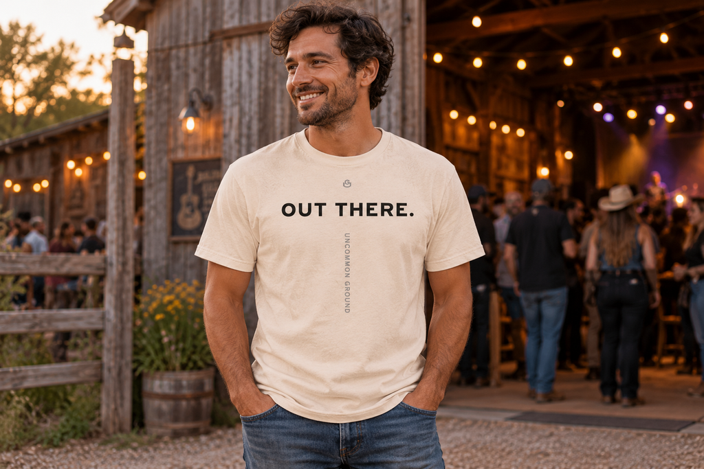 Front of the Out There Tee reading OUT THERE.