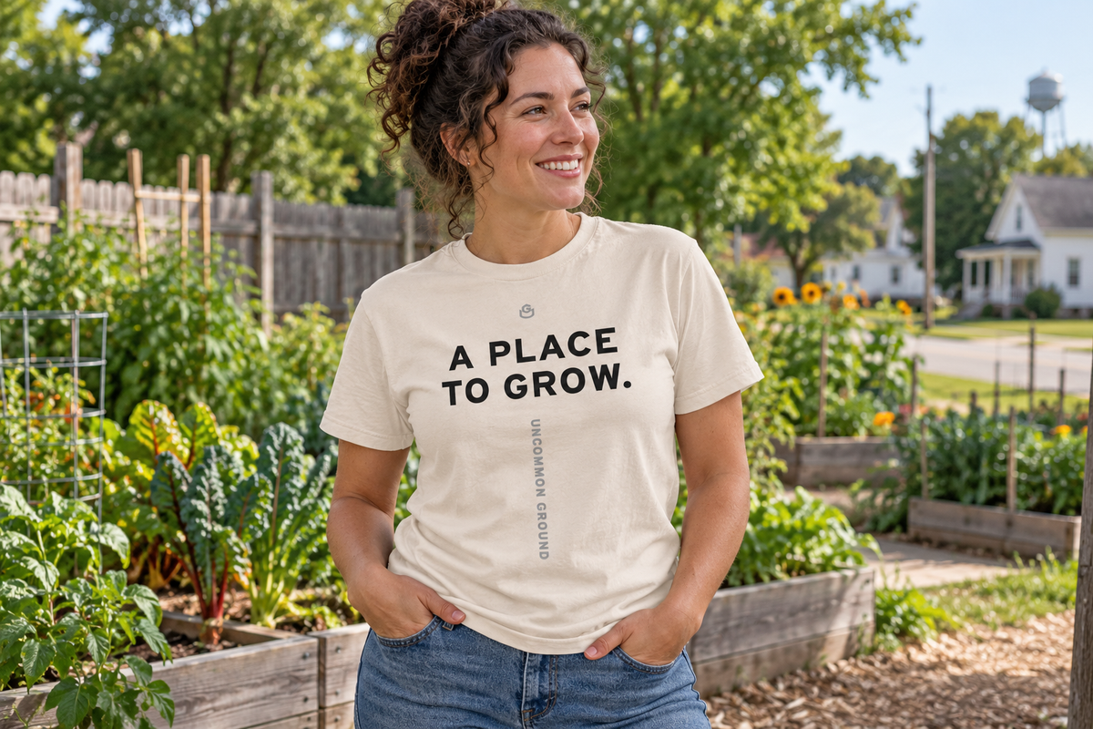 Front of the A Place to Grow Tee reading A PLACE TO GROW.