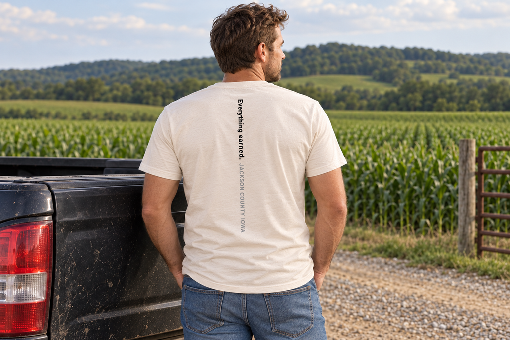 Back of the Row by Row Tee reading Everything earned. Jackson County Iowa